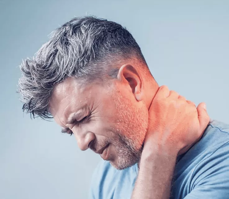 Image of man in pain holding neck